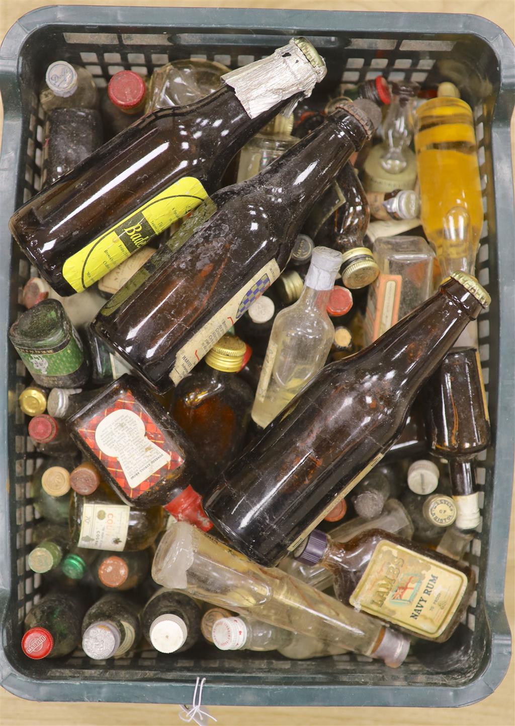 A collection of spirits, liqueurs and ale bottles